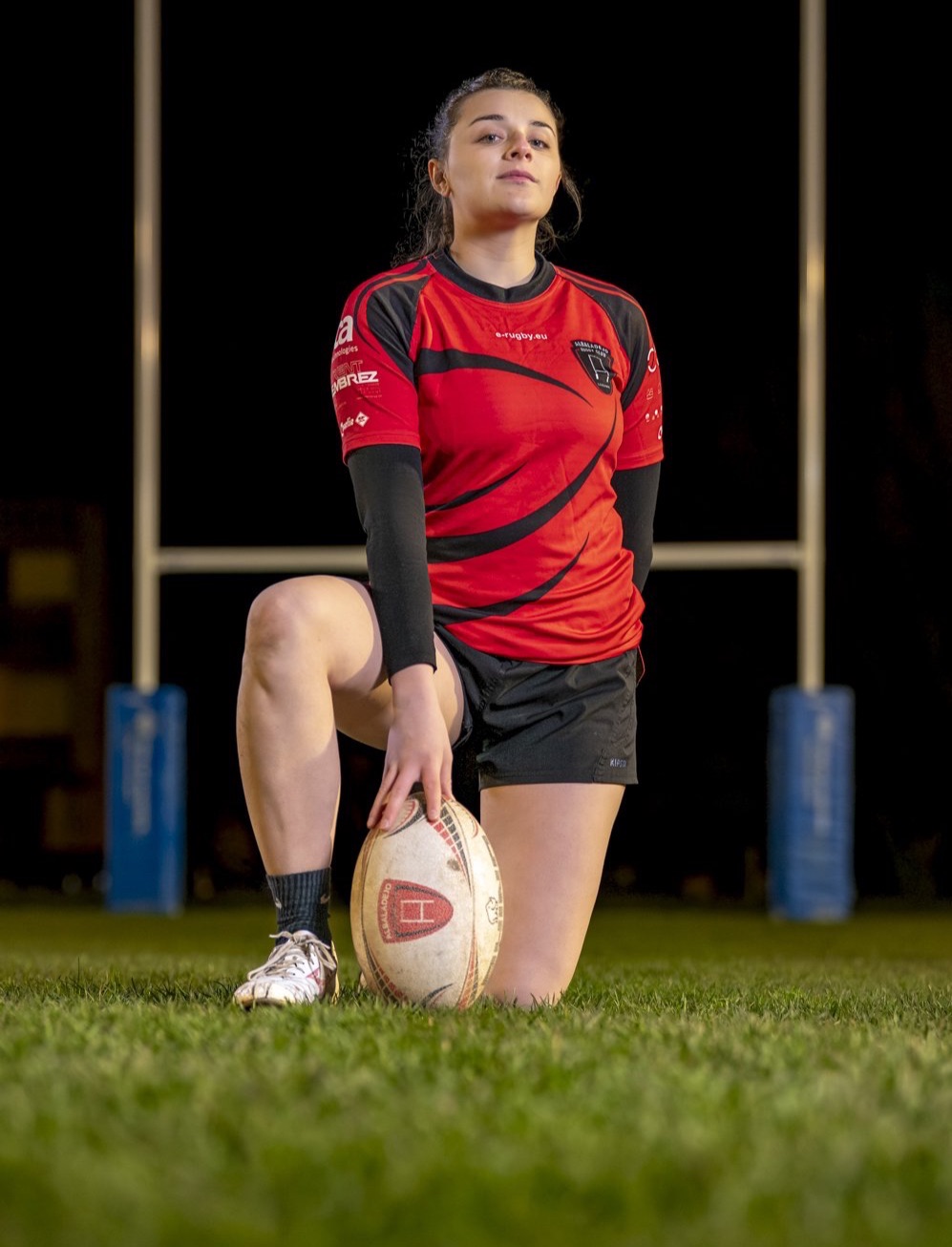 Michael Photographie Albaladejo Rugby Club Lausanne portrait joueuse à genoux 